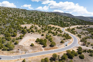 Positioned in a premier location within Red Ledges, Lot 911 is - photo 12