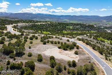 Positioned in a premier location within Red Ledges, Lot 911 is - photo 13