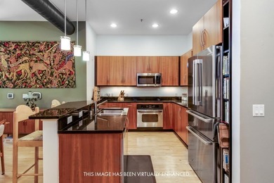 Beautiful, light filled downtown condo offering refined urban