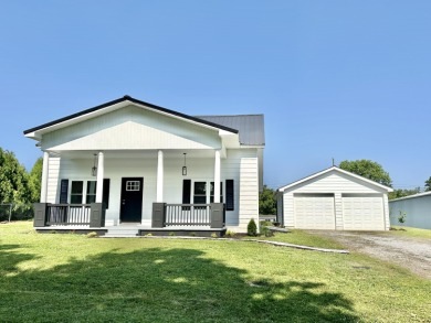 There's tons of room to show off and enjoy in this completely - Lake Home Sale Pending in Bronston, Kentucky