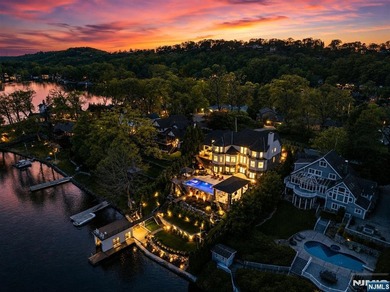 WATCH THE VIDEO! Set on prestigious Manitou Island, this - photo 1