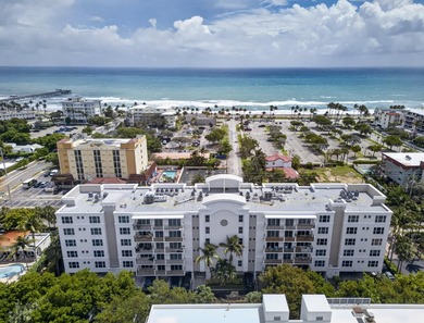 Enjoy coastal living at 1 Ocean Boulevard, just one block from - photo 1