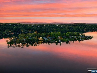 WATCH THE VIDEO! Set on prestigious Manitou Island, this - photo 2
