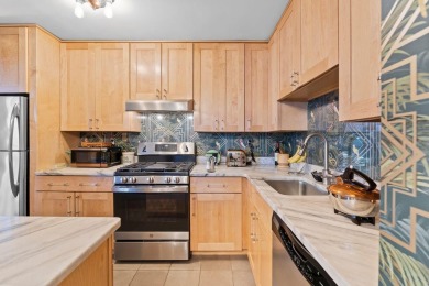 This fully renovated 1,100 sq ft Riviera Towers 1-bedroom