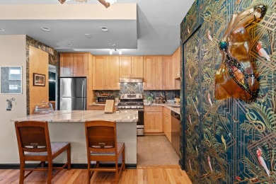 This fully renovated 1,100 sq ft Riviera Towers 1-bedroom