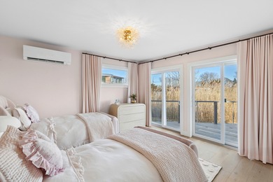 Sited on Sag Harbor Cove in the sought-after Bay Point community - photo 14