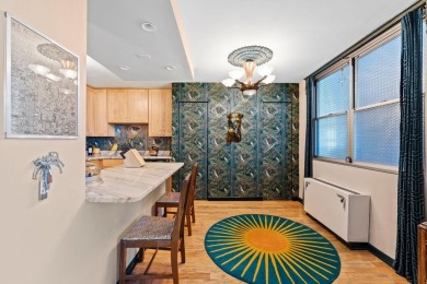 This fully renovated 1,100 sq ft Riviera Towers 1-bedroom