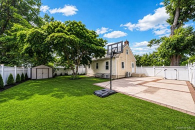 Welcome to this charming 4-bedroom, 2-bath Cape Cod situated on - photo 6