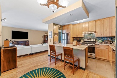 This fully renovated 1,100 sq ft Riviera Towers 1-bedroom