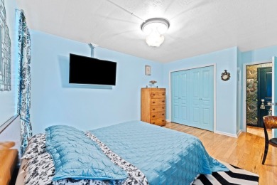 This fully renovated 1,100 sq ft Riviera Towers 1-bedroom