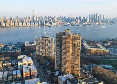 This fully renovated 1,100 sq ft Riviera Towers 1-bedroom