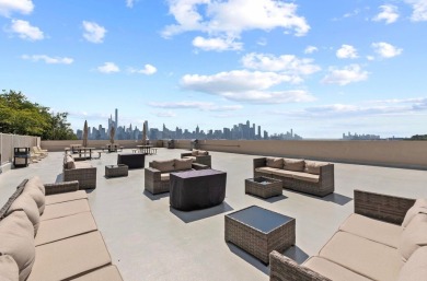 This fully renovated 1,100 sq ft Riviera Towers 1-bedroom