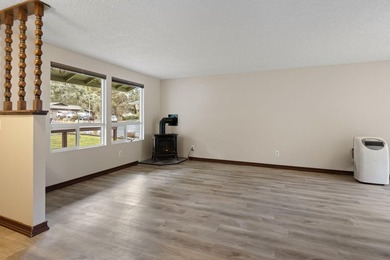 A well-kept single-level 4-bedroom, 2-bath, 1456 Sq. Ft. home in