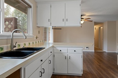 A well-kept single-level 4-bedroom, 2-bath, 1456 Sq. Ft. home in