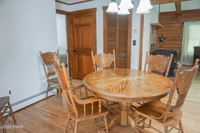 LARGE LOG HOME NESTLED IN A HIGHLY DESIRABLE COMMUNITY JUST - photo 11