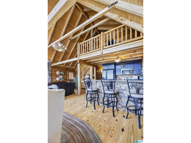 Experience refined lakefront living in this exceptional log - photo 16