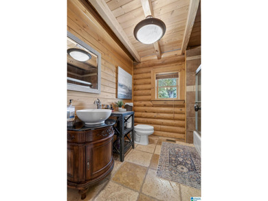 Experience refined lakefront living in this exceptional log - photo 20