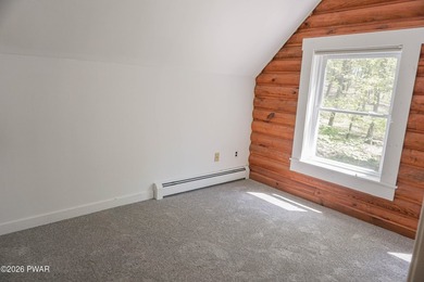 LARGE LOG HOME NESTLED IN A HIGHLY DESIRABLE COMMUNITY JUST - photo 20