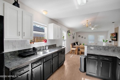 Welcome to this charming 4-bedroom, 2-bathroom home offering - photo 21