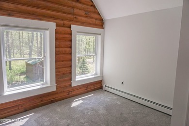 LARGE LOG HOME NESTLED IN A HIGHLY DESIRABLE COMMUNITY JUST - photo 21