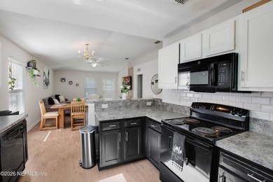 Welcome to this charming 4-bedroom, 2-bathroom home offering - photo 22