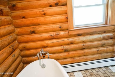 LARGE LOG HOME NESTLED IN A HIGHLY DESIRABLE COMMUNITY JUST - photo 29