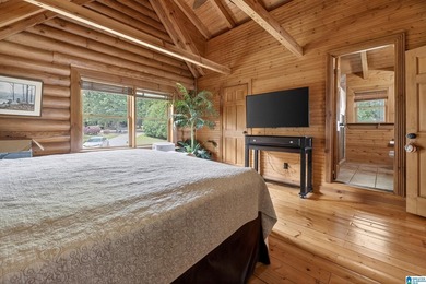 Experience refined lakefront living in this exceptional log - photo 32