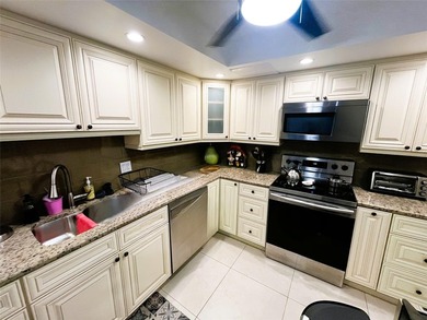 Updated condo with great NE ocean views. Wood tile floors. Split - photo 5