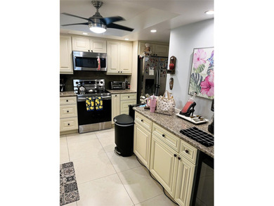 Updated condo with great NE ocean views. Wood tile floors. Split - photo 8