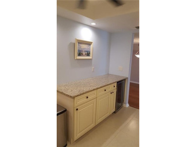 Updated condo with great NE ocean views. Wood tile floors. Split - photo 10