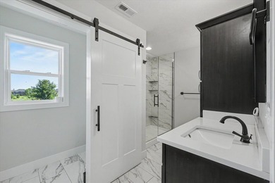 Spacious and beautifully designed, this two-story home with a - photo 23