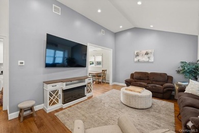 This charming West Islip Multi-level home perfectly blends - photo 2