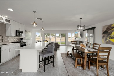 NEWLY REPAINTED - Welcome to your fully remodeled, 3 bedroom (or - photo 12