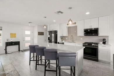 NEWLY REPAINTED - Welcome to your fully remodeled, 3 bedroom (or - photo 13
