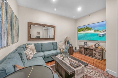 Experience elevated riverfront living in this top-floor