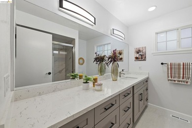 Welcome to this impeccably remodeled home in the highly - photo 19