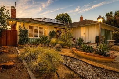 Perched at the top of the hill in Del Cerro, this single-story 4 - photo 1
