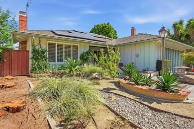 Perched at the top of the hill in Del Cerro, this single-story 4 - photo 2
