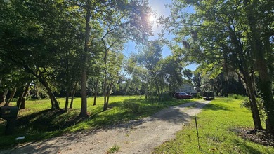 Situated on an impressive 1.6-acre lot, this property offers the - photo 2