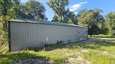 Situated on an impressive 1.6-acre lot, this property offers the - photo 6