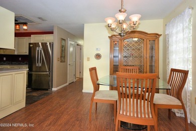 Discover this rare ground-floor unit nestled in a sought after - photo 4