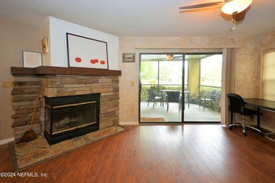 Discover this rare ground-floor unit nestled in a sought after - photo 7