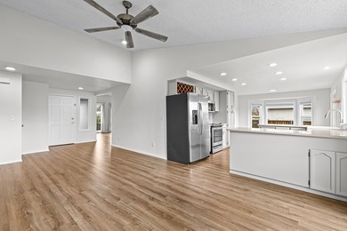 Move-in ready and beautifully positioned on golf course frontage