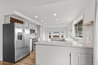 Move-in ready and beautifully positioned on golf course frontage