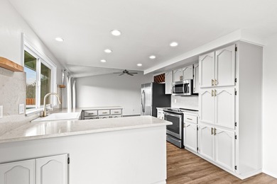 Move-in ready and beautifully positioned on golf course frontage