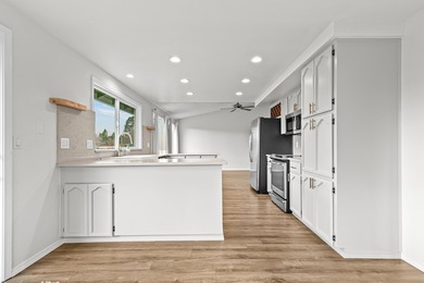 Move-in ready and beautifully positioned on golf course frontage