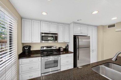 Beautifully maintained 2-bedroom, 2-bath first-floor corner - photo 5