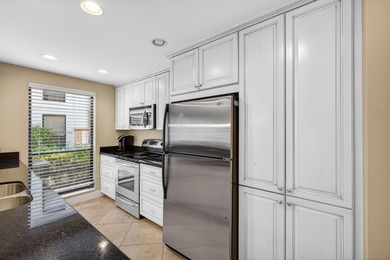 Beautifully maintained 2-bedroom, 2-bath first-floor corner - photo 6