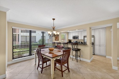 Beautifully maintained 2-bedroom, 2-bath first-floor corner - photo 9