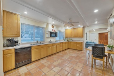 Beautiful modern hacienda-style home backing to a lush greenbelt